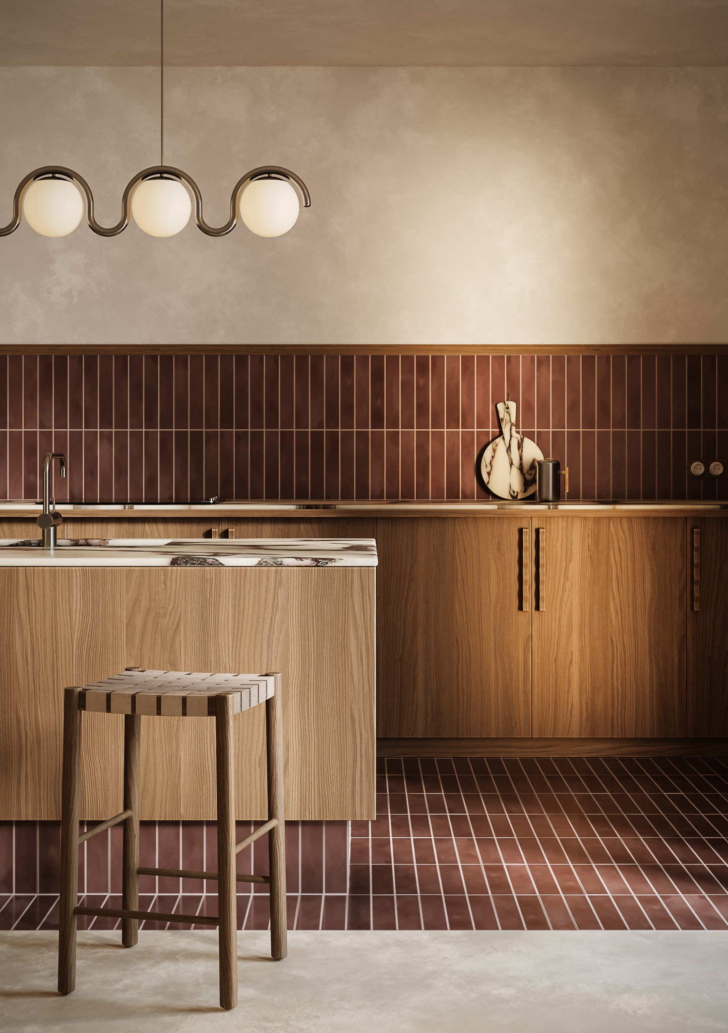 Cocina en azulejos burgundy con encimera en calacatta viola. Isla en madera con taburetes y lámpara ondulada.